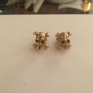 Juicy couture gold skull earrings with green eyes